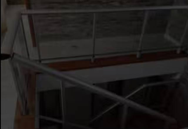 Baranda de aluminio y vidrio en entrepiso